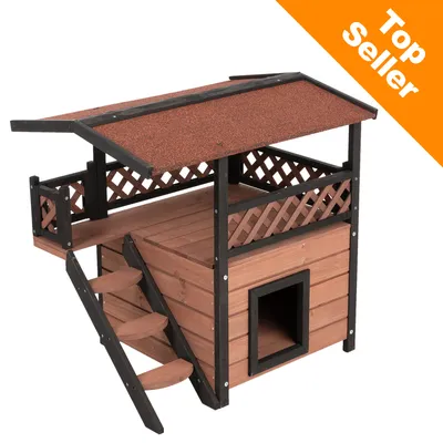 Casetta per animali in legno con tetto rosso, scala laterale e terrazza superiore. Angolo arancione in alto a destra con testo: Top Seller.