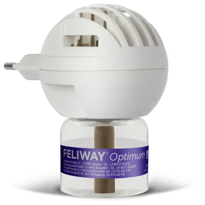 Feliway Optimum изпарител с флакон, бяла приставка и лилав етикет на стъклената бутилка. Продукт за подпомагане на благосъстоянието на домашни любимци.