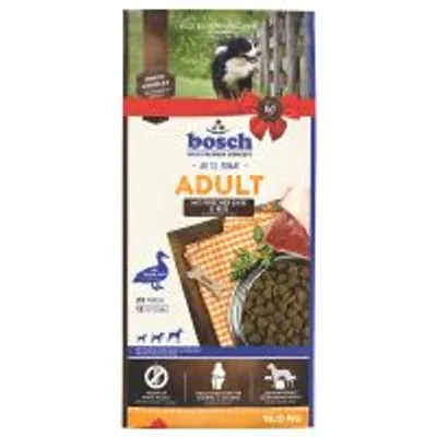 Confezione di crocchette per cani Bosch Adult con anatra e riso, immagine di ciotola con crocchette, scritta 'ADULT', simbolo anatra, peso 15 kg visibile sulla confezione. Confezione di crocchette per cani Bosch Adult con anatra e riso, immagine di ciotola con crocchette, scritta 'ADULT', simbolo anatra, peso 15 kg visibile sulla confezione.