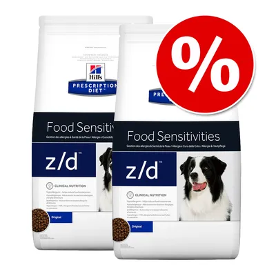 Hill's Prescription Diet Food Sensitivities z/d kutyatáp, két csomag, elöl fekete-fehér kutya képe, piros százalékos akciójelzés a jobb felső sarokban