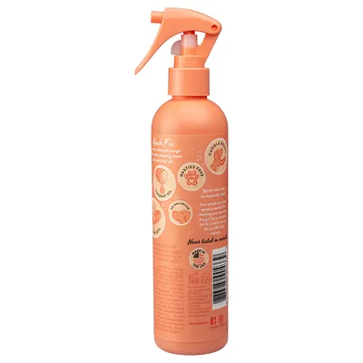 Quick Fix Spray med kokosolie, pH-afbalanceret, aldrig testet på dyr, fremstillet i USA. Beskrivelse og ingredienser synlige på flasken.