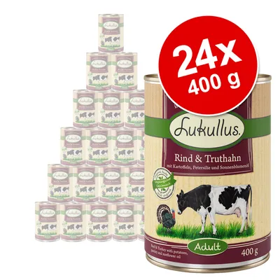 Lukullus Rind & Truthahn Adult, zestaw 24 puszek po 400 g. Na etykiecie widoczne krowa i indyk oraz tekst: mit Kartoffeln, Petersilie und Sonnenblumenöl.