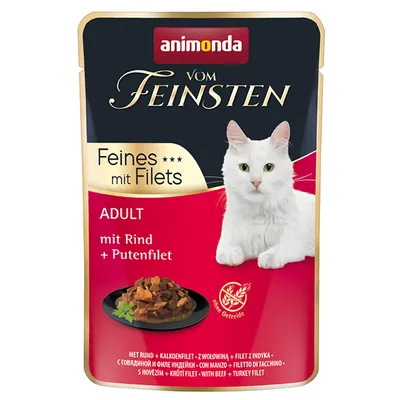 Animonda vom Feinsten Adult jemné s filetami, s hovädzím a morčacím filetom, bez obilnín. Zobrazenie bielej mačky a podávaného krmiva.