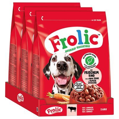 Frolic hondenvoer met rund, 2,6 kg verpakking. Tekst: 'Mit frischem Rind', '100% komplett'. Afbeelding van een Dalmatier en voer in ringvorm, wortel zichtbaar op de verpakking.