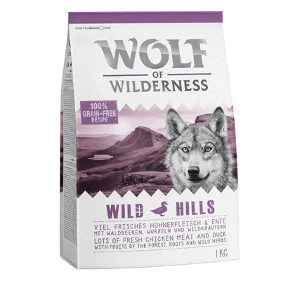 Sac Wolf of Wilderness Wild Hills 1 kg, 100 % grain-free recipe, lots of fresh chicken meat and duck with fruits of the forest, roots and wild herbs. Texte en anglais et allemand visible.