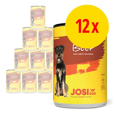 Lot de 12 boîtes JosiDog Sauce Beef pour chien adulte, étiquette jaune et rouge avec image d’un chien et mention bœuf en plusieurs langues. Marque visible : JosiDog. Lot de 12 boîtes JosiDog Sauce Beef pour chien adulte, étiquette jaune et rouge avec image d’un chien et mention bœuf en plusieurs langues. Marque visible : JosiDog.