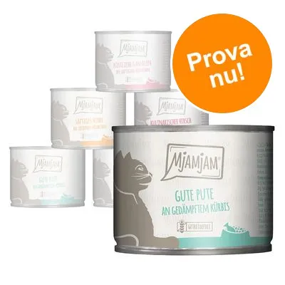 Flera burkar MjAMjAM kattmat, främre burk med texten 'GUTE PUTE AN GEDÄMPFTEM KÜRBIS'. Orange cirkel med texten 'Prova nu!'.