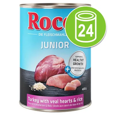 Rocco Junior kalkoen met kalfsharten & rijst, 400g blik. Tekst: supports healthy growth, calcium. Verpakking toont vlees en rijst. Groene cirkel met 24 blikken symbool.