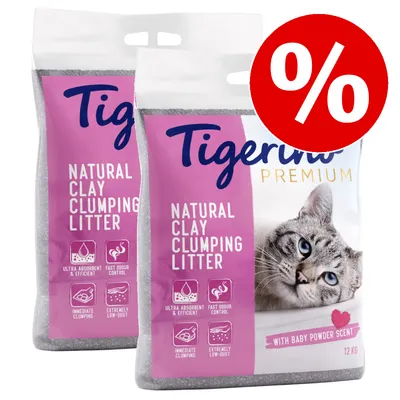 Două saci Tigerino Premium Natural Clay Clumping Litter, 12 kg, cu imagine de pisică și text: ultra absorbent & eficient, control rapid al mirosului, aglomerare imediată, praf foarte redus, ofertă procentuală.