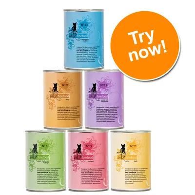 Six tins of cat finefood in assorted colours and flavours with a large orange circle displaying the text 'Try now!' Six tins of cat finefood in assorted colours and flavours with a large orange circle displaying the text 'Try now!'