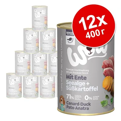 Комплект 12 консерви по 400 г WOW с патица, водорасли и сладък картоф. Видим текст: 71 % месо и вътрешности, 0 % зърнени храни и глутен. Canard-Duck-Pato-Anatra.