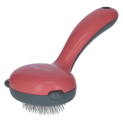 Brosse à poils fins en métal avec manche ergonomique rose et gris, marque visible : Kerbl