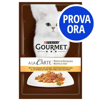 Purina Gourmet A la Carte, ricetta con tacchino e verdure. Etichetta blu con testo: PROVA ORA.