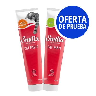 Smilla Cat Paste, tubos de 200 g con textos visibles: Multi-Vitamin, Malt, With Vitamins, Hairball Prevention. Oferta de prueba en círculo azul.
