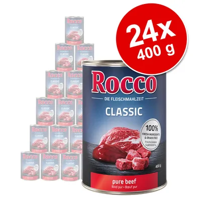 Rocco Classic pure beef, 24 x 400 g dåser. Synlig tekst: 100% fresh ingredients & grain-free, Rind pur, Bœuf pur. Billede af oksekød på dåseetiket.
