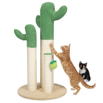 Cat tree in cactus design with three green columns, wrapped in sisal. Two cats interact with the cat tree, one plays and the other sits beside it.