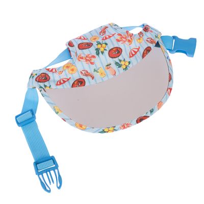 Blue pet sun cap with colourful pattern of fruits, lobsters and sun umbrellas. Adjustable strap with click fastener.