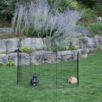 Recinto in metallo per piccoli animali, rotondo, su prato verde con due conigli. Adatto per uso esterno.