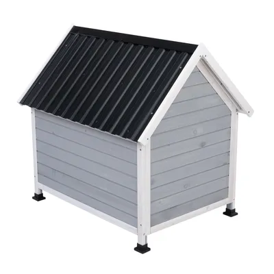 Niche pour chien en bois gris avec toit à deux pentes en métal noir, surélevée sur quatre pieds noirs. Aucun logo ou texte visible.