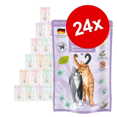 Kissan märkäruokapakkaus, päällä teksti '24x'. Pussissa kaksi kissaa, saksalainen lippu, merkintä 'Ohne Tierversuche', makuna ankka ja siipikarja, viljaton, lohiöljy, simpukka.