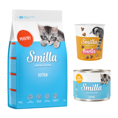 Smilla Kitten: balení 1 kg, pět konzerv Smilla Kitten a krabička Smilla Hearties. Červený symbol procenta označující akční nabídku.
