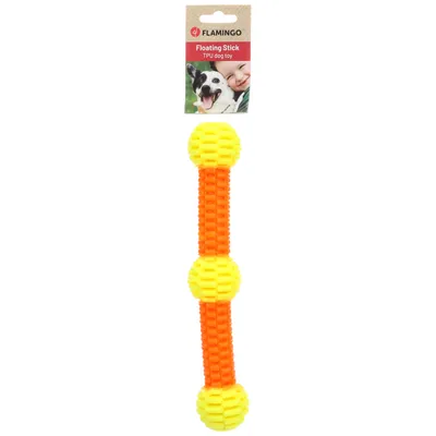 Jouet pour chien Flamingo Floating Stick, bâton flottant en TPU orange et jaune, emballage avec nom du produit visible.