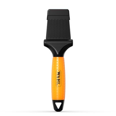 Brosse WAHL avec tête noire et manche orange, structure visible sur la tête de la brosse.