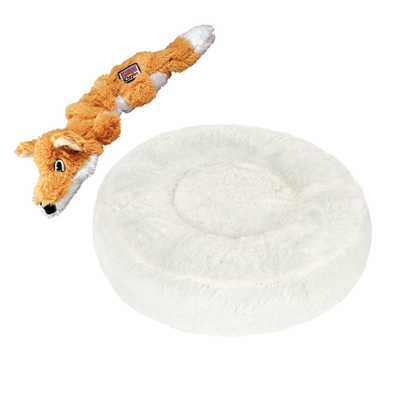 Plüschspielzeug in Fuchsform und rundes, weißes Kuschelbett mit rotem Prozentzeichen für Rabattaktion.