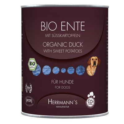 Lata de Herrmann's Manufaktur, BIO ENTE mit Süßkartoffeln, Organic Duck with Sweet Potatoes, Für Hunde, varios sellos ecológicos visibles y foto de un perro en la etiqueta.
