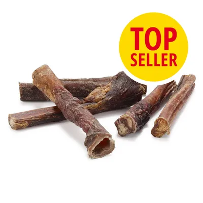 Snack per cani a forma di bastoncini essiccati, etichetta gialla con testo rosso 'TOP SELLER' visibile nell'immagine.