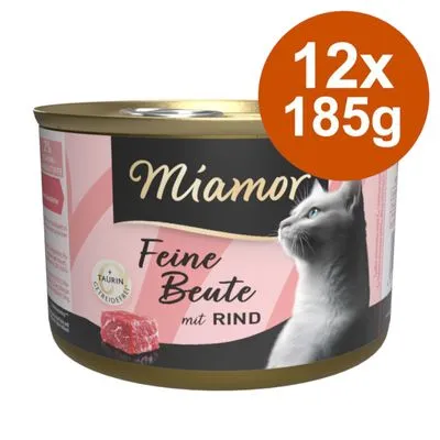 Miamor Feine Beute mit Rind kattenvoer, 12x185g. Op het blik: afbeelding van een kat, stukjes rundvlees, tekst 'Taurin', 'GRAANVRIJ'.