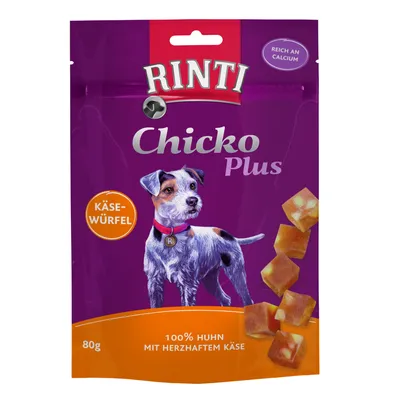 Rinti Chicko Plus KÄSE-WÜRFEL, 100% Huhn mit herzhaftem Käse, 80 g. Pakkauksessa koiran kuva ja juustokuutioita. Teksti: reich an calcium.