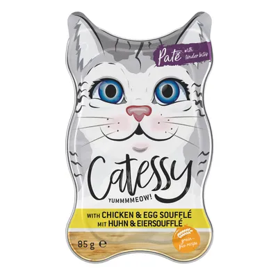 Catessy Pate mit Huhn & Eiersoufflé, 85g, getreidefreie Rezeptur. Verpackung in Katzenform mit blauäugiger Katze und Text 'Yummmmeow!'.
