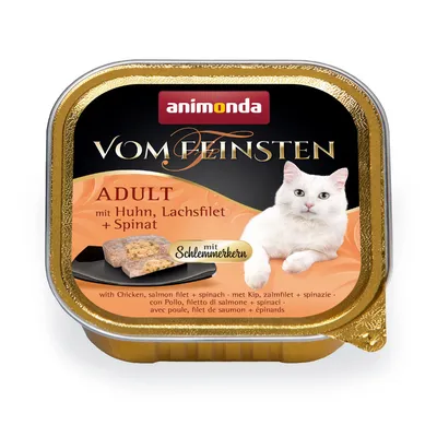 Adult food with chicken, salmon fillet and spinach, shown in a tray with product pieces and a white cat image. Text includes 'mit Schlemmerekern'. Adult food with chicken, salmon fillet and spinach, shown in a tray with product pieces and a white cat image. Text includes 'mit Schlemmerekern'.