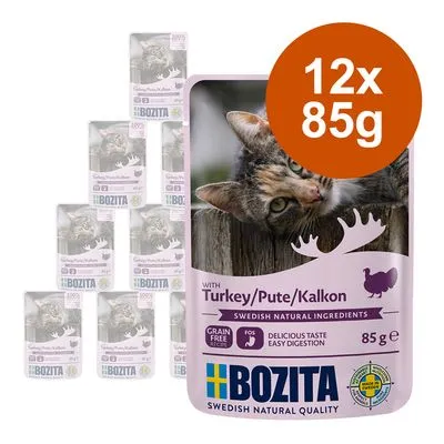 Embalagens de comida húmida para gatos Bozita com peru, 12 x 85 g. Texto visível: 'with Turkey/Pute/Kalkon', 'Grain Free Recipe', 'Delicious Taste Easy Digestion', 'Swedish Natural Ingredients'. Embalagens de comida húmida para gatos Bozita com peru, 12 x 85 g. Texto visível: 'with Turkey/Pute/Kalkon', 'Grain Free Recipe', 'Delicious Taste Easy Digestion', 'Swedish Natural Ingredients'.