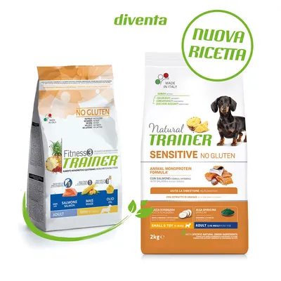 To poser hundefoder: Fitness3 Trainer Adult Mini med laks, majs og olie, samt Natural Trainer Sensitive No Gluten med laks. Tekst: NO GLUTEN, NUOVA RICETTA, MADE IN ITALY.