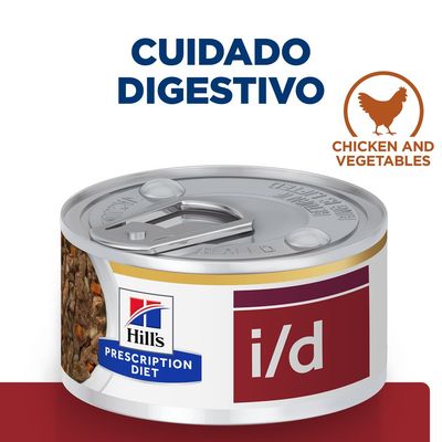 Lata de Hill's Prescription Diet i/d. Texto visible: 'Cuidado digestivo'. Etiqueta en inglés: 'Chicken and vegetables'. Imagen de pollo. Parte del contenido visible en la lata.