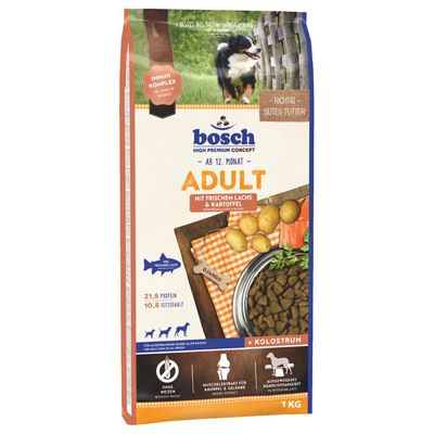 bosch ADULT mit frischem Lachs & Kartoffel, сухой корм для взрослых собак, 21,5 % протеин, 10,5 % жир, без пшеницы, 1 кг. Видны картофель, миска с кормом, логотипы и значки.