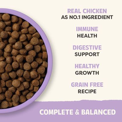 REAL CHICKEN as the main ingredient, IMMUNE HEALTH, DIGESTIVE SUPPORT, HEALTHY GROWTH, GRAIN FREE RECIPE, COMPLETE & BALANCED. Bowl with visible brown kibbles.