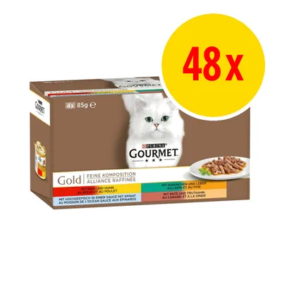Purina Gourmet Gold kissan märkäruoka, 48 x 85 g. Pakkauksessa valkoinen kissa ja annosruokakuva. Näkyvissä maut: naudanliha, kana, kaniini, maksa, ankka, kalkkuna, lohi, pinaatti.