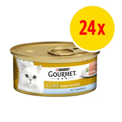 Purina Gourmet Gold Feine Pastete mit Thunfisch -kissan märkäruokapurkki, pakkauksessa 24 kpl. Kannen avausrengas näkyvissä, etiketissä valkoinen kissa ja tuotekuva.