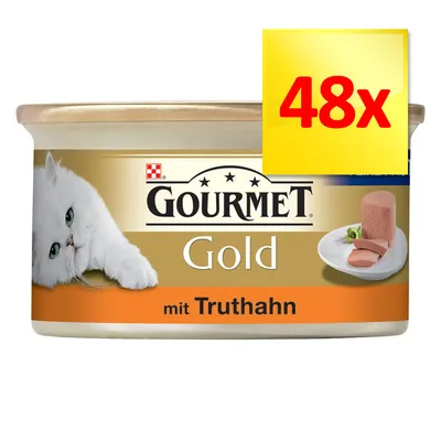 GOURMET Gold mit Truthahn, lot de 48x. Boîte illustrée avec un chat blanc et une assiette de pâté. Texte en allemand visible sur l’emballage. GOURMET Gold mit Truthahn, lot de 48x. Boîte illustrée avec un chat blanc et une assiette de pâté. Texte en allemand visible sur l’emballage.