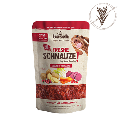 bosch FRESHE SCHNAUZE Dog Food Topping, Erfolg Hitts Ackermisch, veganské, 200g, bez obilovin, z Bádenska-Württemberska, s obrázky zeleniny a obrázkem psa.