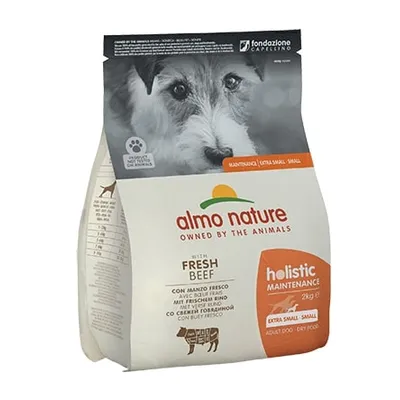 Sacchetto di crocchette per cani Almo Nature Holistic Maintenance con manzo fresco, 2 kg, indicato per taglia extra small e small. Testo visibile: fondazione Capellino.
