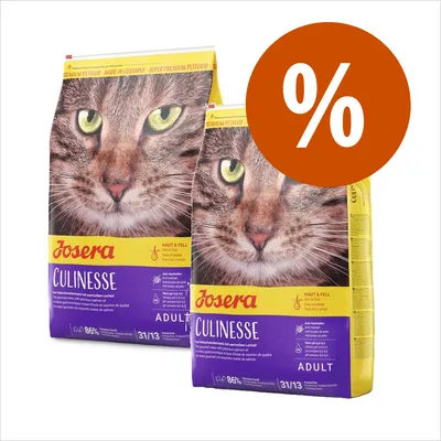 Due sacchi di crocchette per gatti Josera Culinesse Adult, scritta promozionale con simbolo percentuale su sfondo arancione.