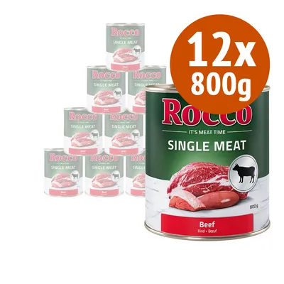 12 lattine da 800 g di Rocco Single Meat Beef, confezione visibile con etichetta verde e rossa, immagine di carne bovina e simbolo cane nero su sfondo bianco.