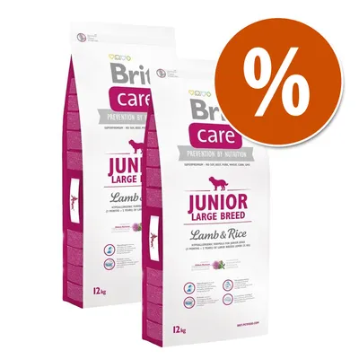 Due sacchi Brit Care Junior Large Breed Lamb & Rice 12 kg con simbolo percentuale arancione, visibile testo: PREVENTION BY NUTRITION, ipoallergenico, per cuccioli di taglia grande.