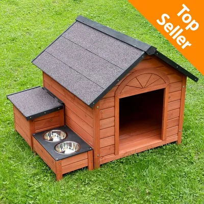 Cuccia in legno per cani con tetto a spiovente, due ciotole in metallo integrate e scritta Top Seller su sfondo arancione nell'angolo in alto a destra.