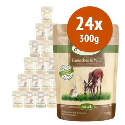 Confezione di cibo per animali Kaninchen & Wild Adult, 24 buste da 300 g ciascuna. Sulla confezione sono visibili un coniglio e un cervo.