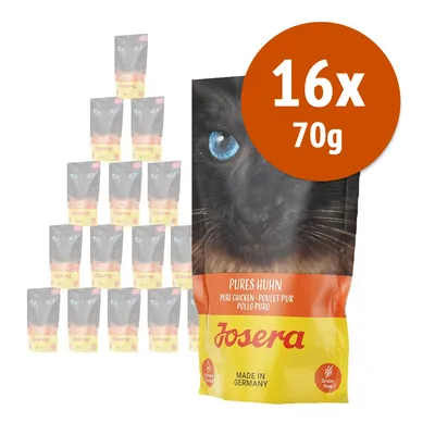 Confezione Josera Pures Huhn Pollo Puro, 16 bustine da 70 g ciascuna, scritta 'Grain-free', immagine di un gatto nero con occhi azzurri, testo visibile in tedesco e inglese. Confezione Josera Pures Huhn Pollo Puro, 16 bustine da 70 g ciascuna, scritta 'Grain-free', immagine di un gatto nero con occhi azzurri, testo visibile in tedesco e inglese.